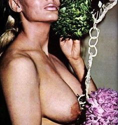 Carol Doda holding her flowers